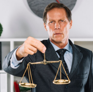 A lemon lawyer holding the scales of justice